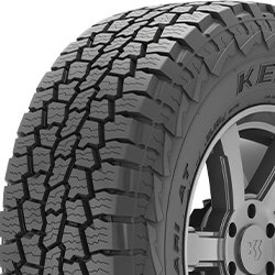 All-terrain tire with rugged tread pattern for off-road and on-road use.