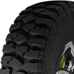 Off-road tire with rugged tread for heavy-duty vehicles.