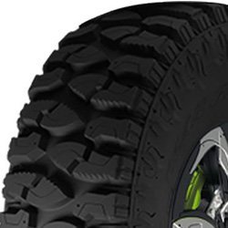Off-road tire with rugged tread pattern for durability and traction.