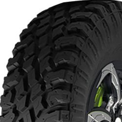 Off-road tire with rugged tread pattern for heavy-duty vehicles.