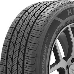 Close-up of Kelly Edge Touring Plus tire with detailed tread pattern.