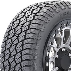 All-weather tire with rugged tread pattern for off-road and on-road use.