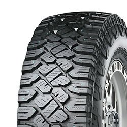Off-road tire with rugged tread pattern for durability and traction.
