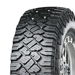 Off-road tire with rugged tread pattern for all-weather performance.