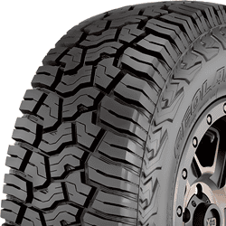 All-terrain tire with rugged tread pattern for off-road use.