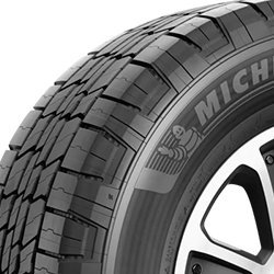 Michelin tire close-up showing tread pattern and sidewall details.