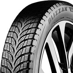 Close-up of a high-performance tire with detailed tread pattern.