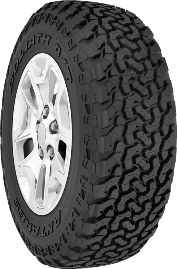 All-terrain tire with rugged tread for off-road driving.