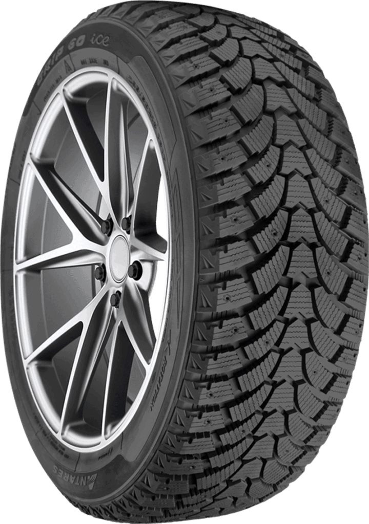 All-terrain tire with rugged tread pattern and alloy wheel for winter driving.