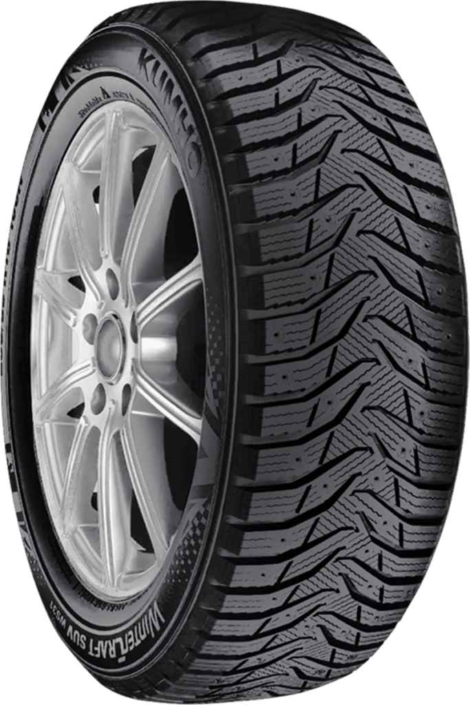 Kumho WS31 winter tire with detailed tread pattern and alloy wheel.