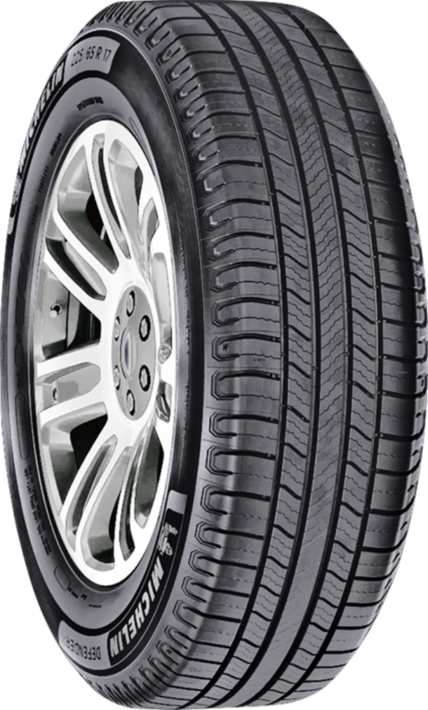 Michelin Defender2 tire with detailed tread pattern and alloy wheel.