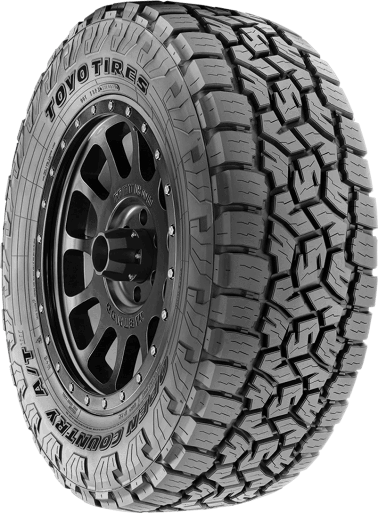 Off-road tire with rugged tread pattern for tough terrains.