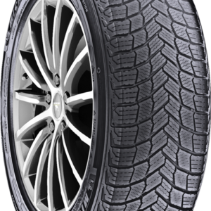 All-terrain tire with a detailed tread pattern and alloy wheel rim.