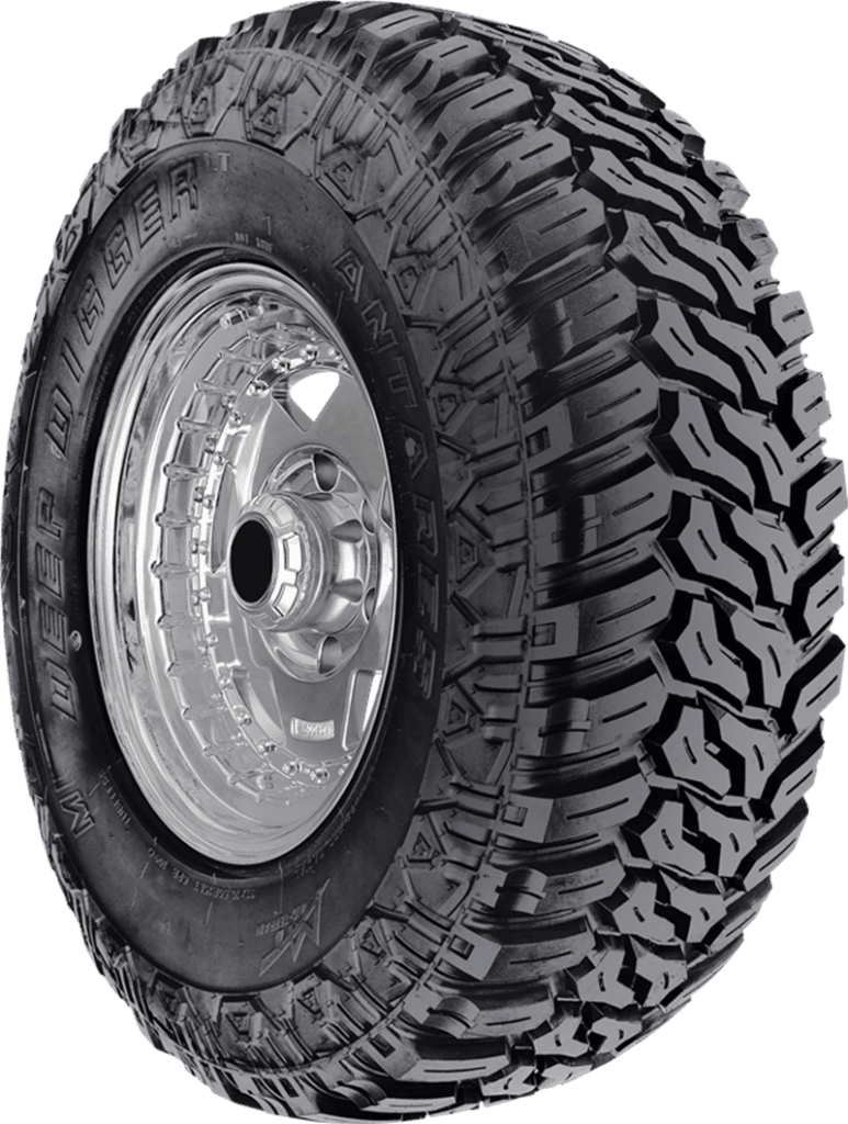 Off-road tire with aggressive tread pattern for all-season use.