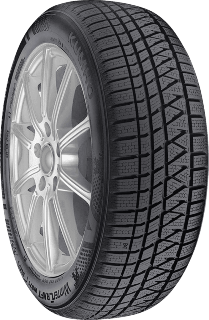 Kumho winter tire with detailed tread pattern and alloy wheel.