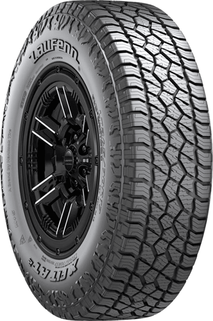 All-terrain tire with rugged tread pattern for off-road and on-road use.