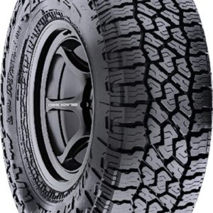 All-terrain tire with rugged tread pattern for off-road use.