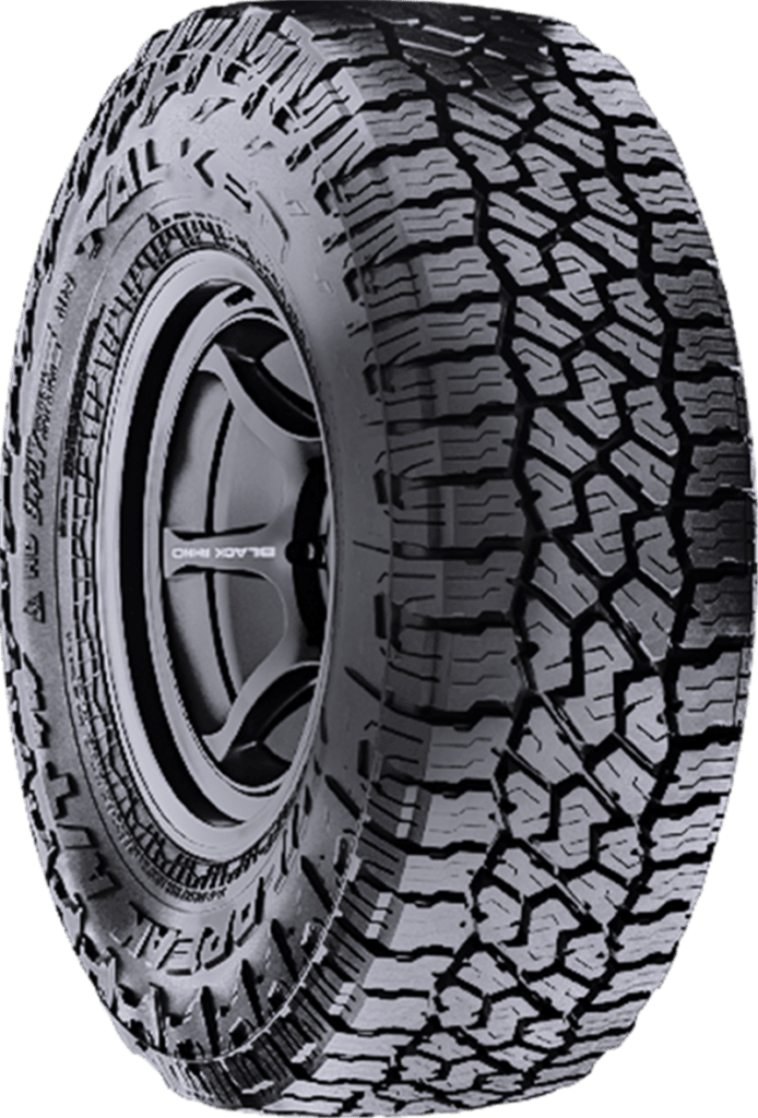 All-terrain tire with rugged tread pattern for off-road use.