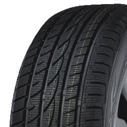 Close-up of Migo Tire Corp. tire showing detailed tread pattern.
