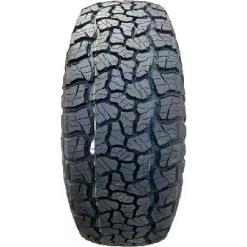 Off-road tire with rugged tread pattern for all-terrain driving.