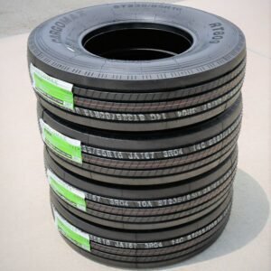 Stack of new Migo Tire Corp. tires for commercial vehicles.