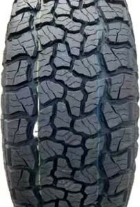 Off-road tire with rugged tread pattern for durability and traction.