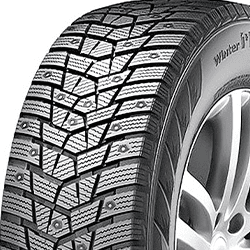 Winter tire with detailed tread pattern for snow and ice conditions.