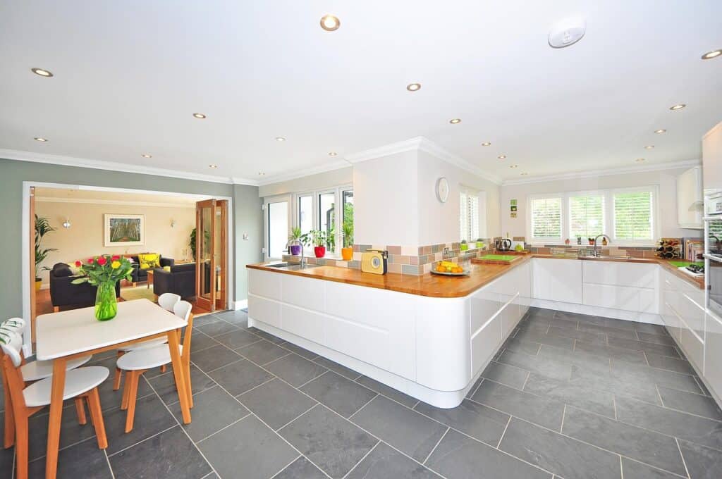 Open-plan kitchen and living areas viewed together as part of the whole home
