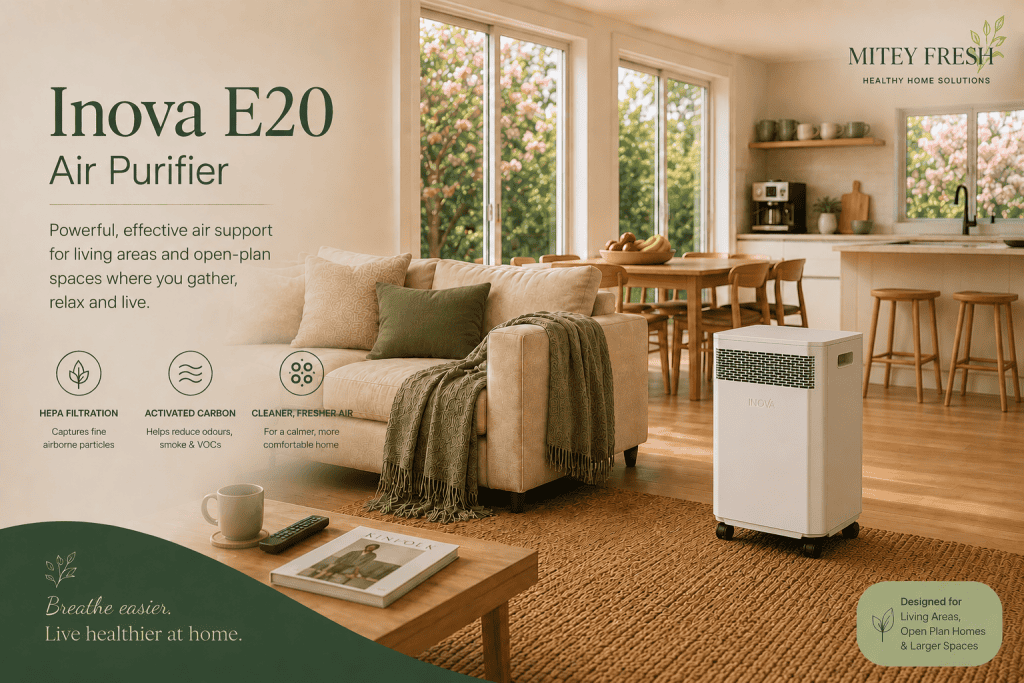 Inova E20 air purifier positioned within a calm open-plan living room and family entertainment space