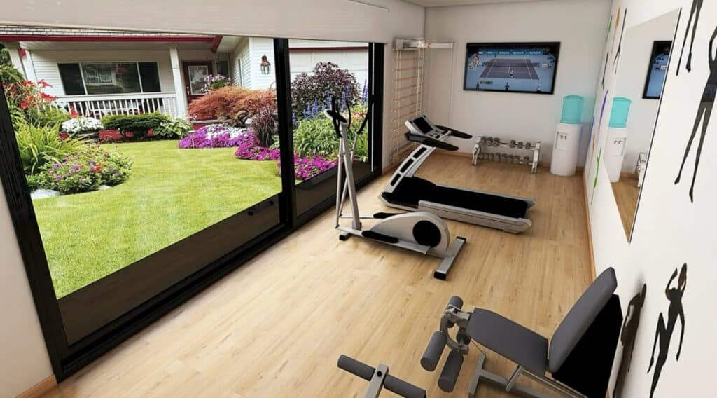 Gimnasio en casa con vistas al jardín