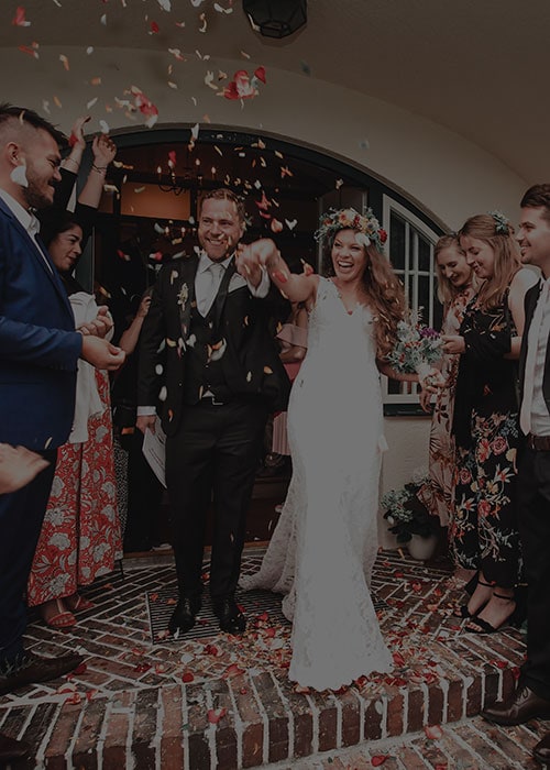 Joyful wedding celebration at Mountain Harbour with happy couple and guests.
