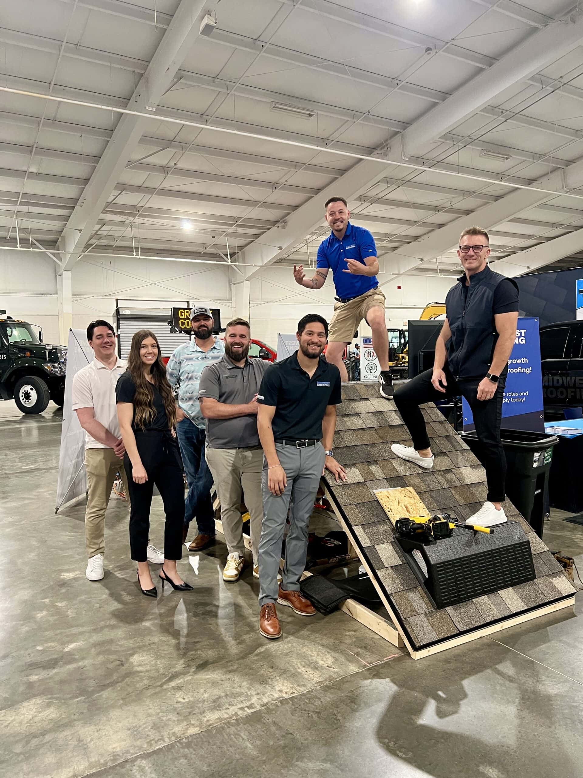 Roofing professionals demonstrating roofing techniques at Midwest Roofing.