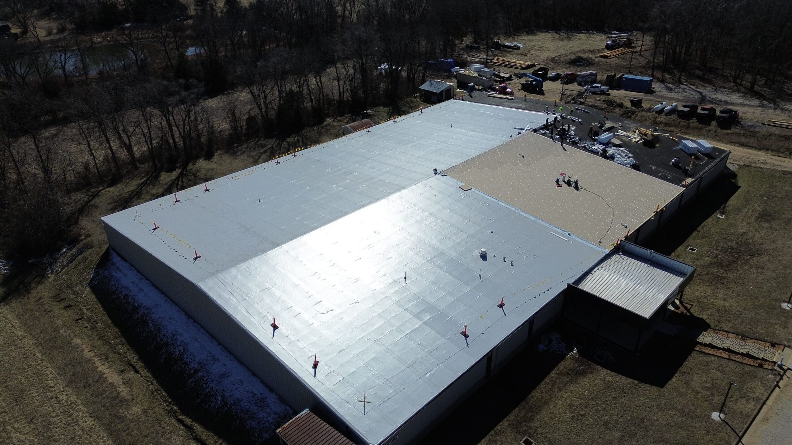 Aerial view of Midwest Roofing warehouse with metal roofing panels.