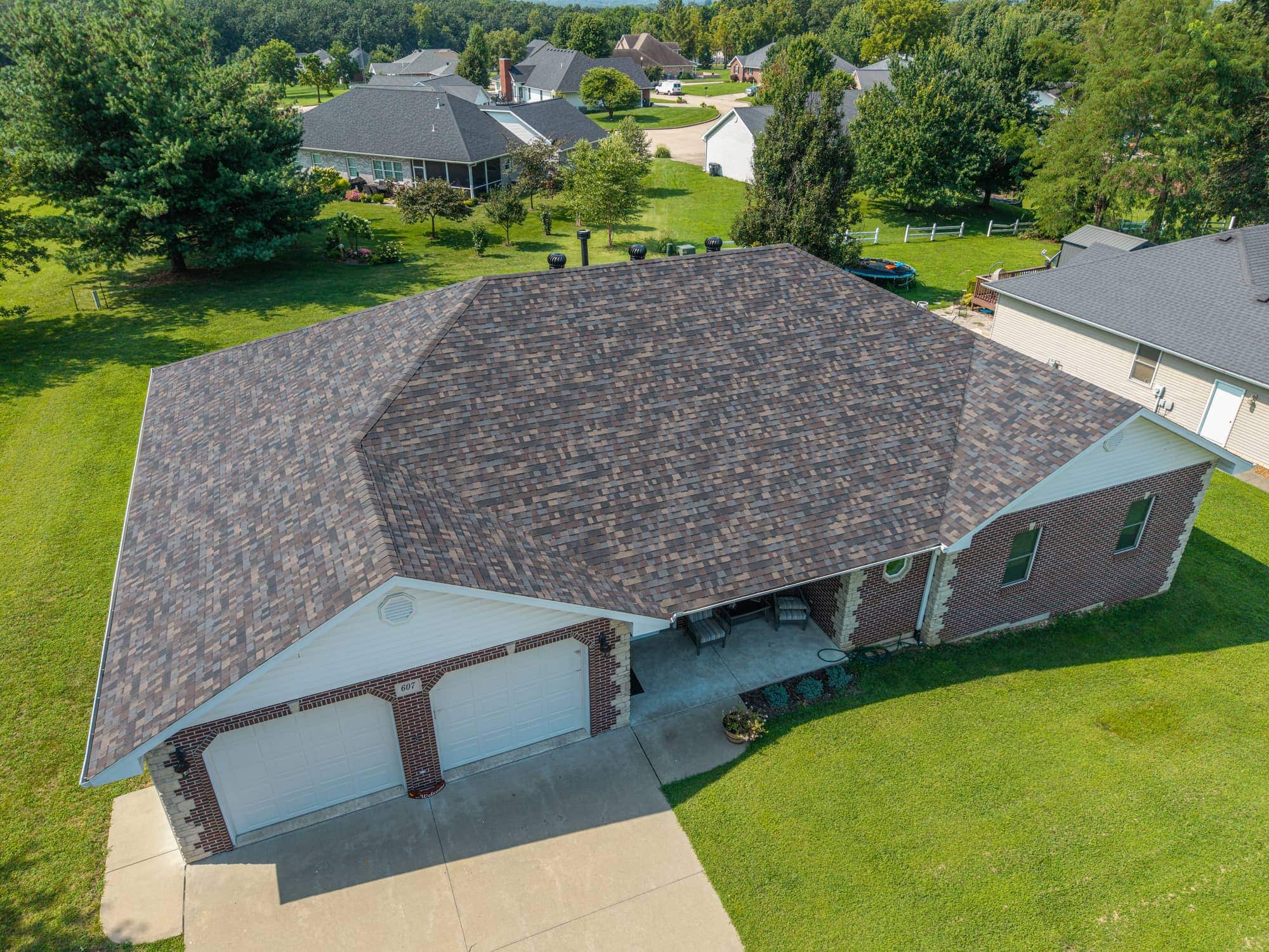 New asphalt shingle roof on a residential home in California, MO.