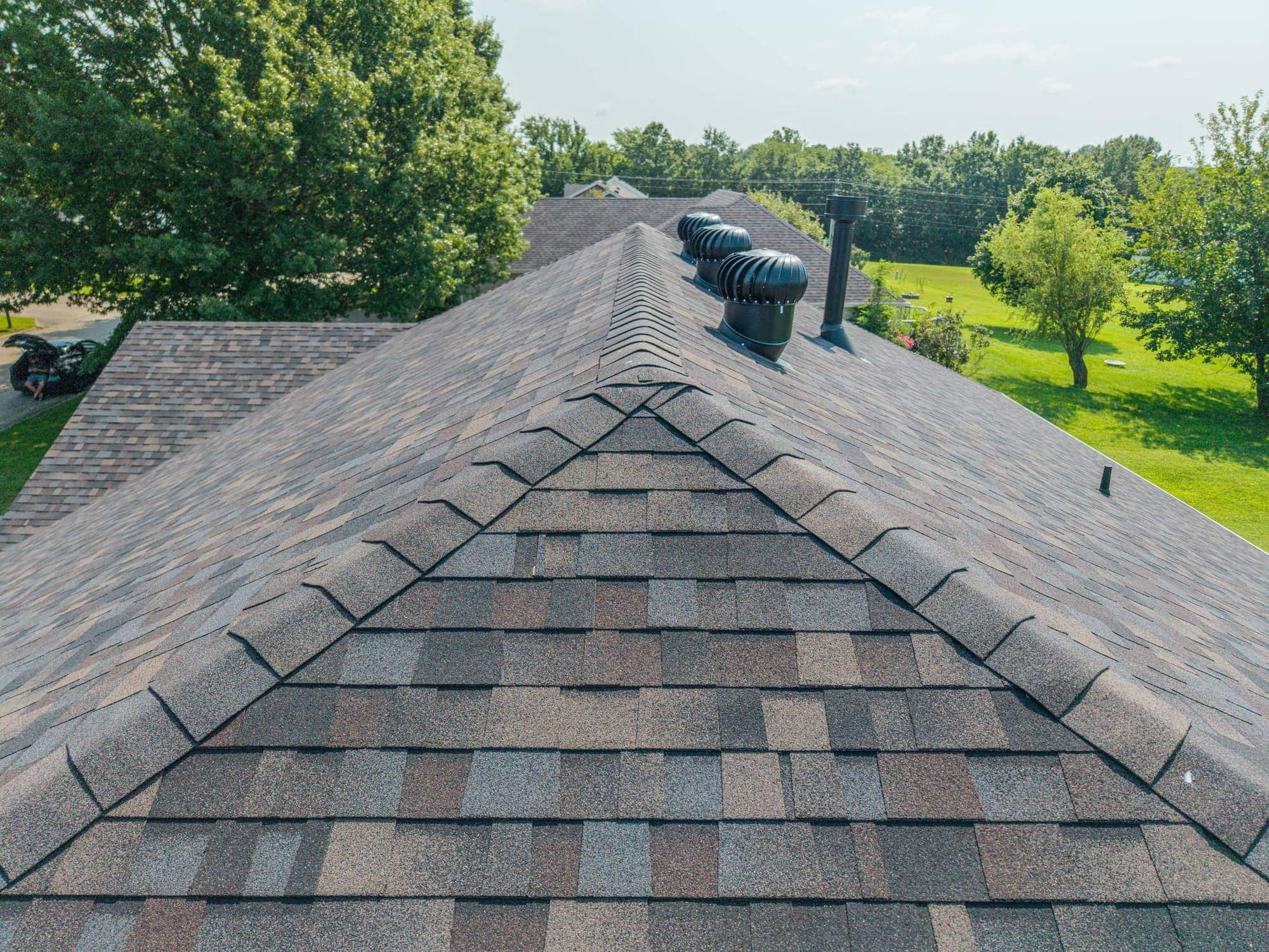 New asphalt shingle roof installed on residential home in California, MO.