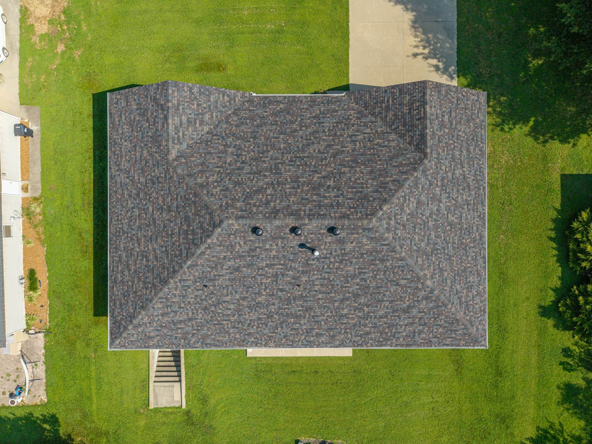 Aerial view of a new asphalt shingle roof in California, MO.