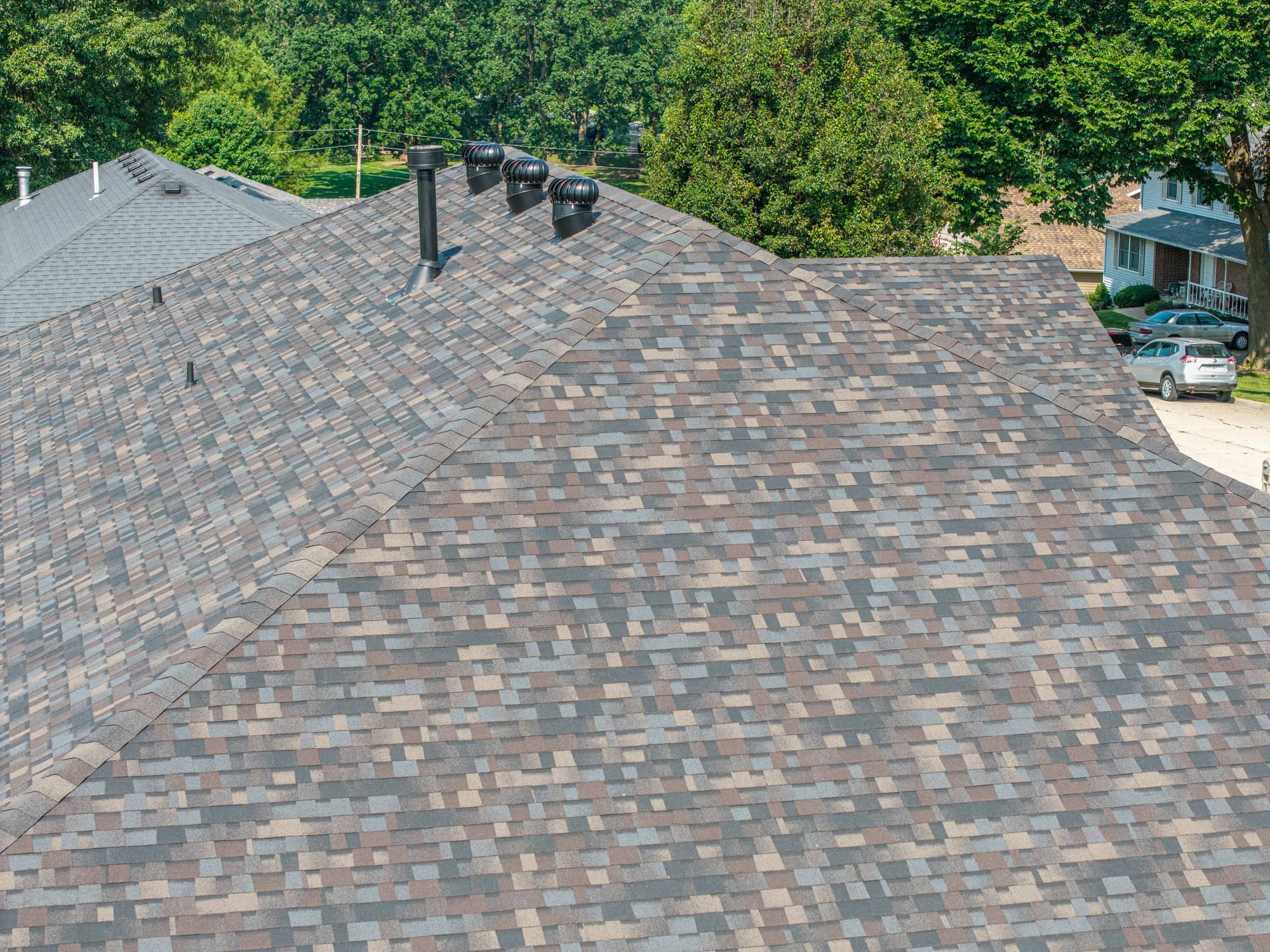 New asphalt shingle roof installed on residential home in California, MO.