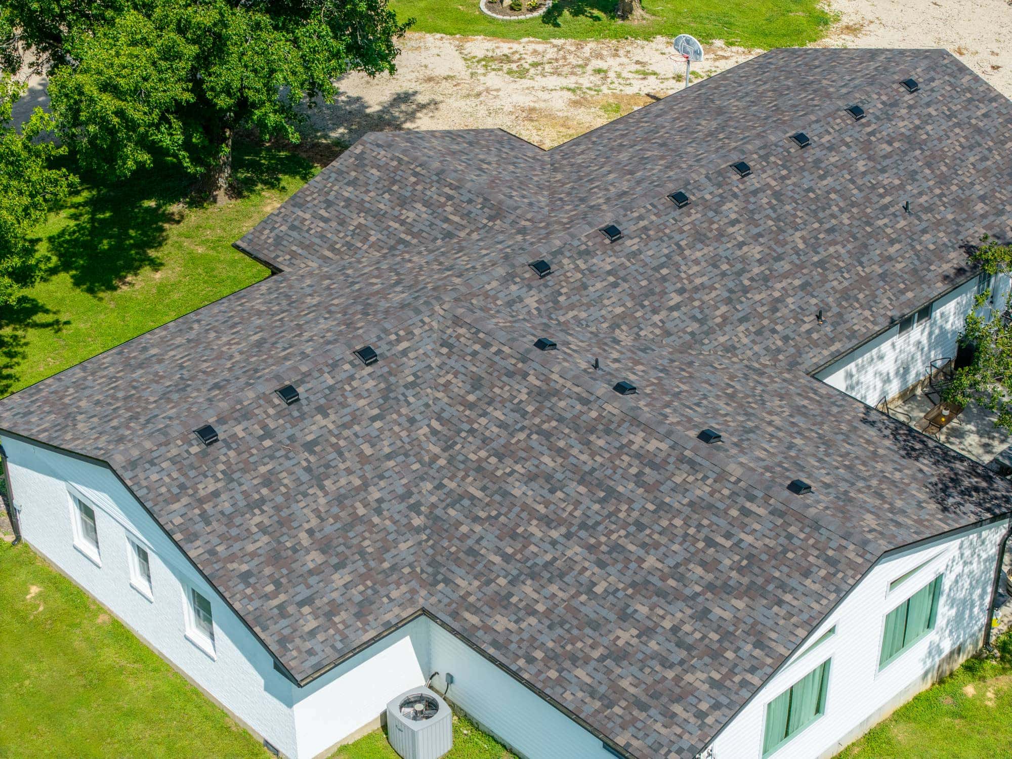 New asphalt shingle roof installed on residential home in Eugene, Missouri.