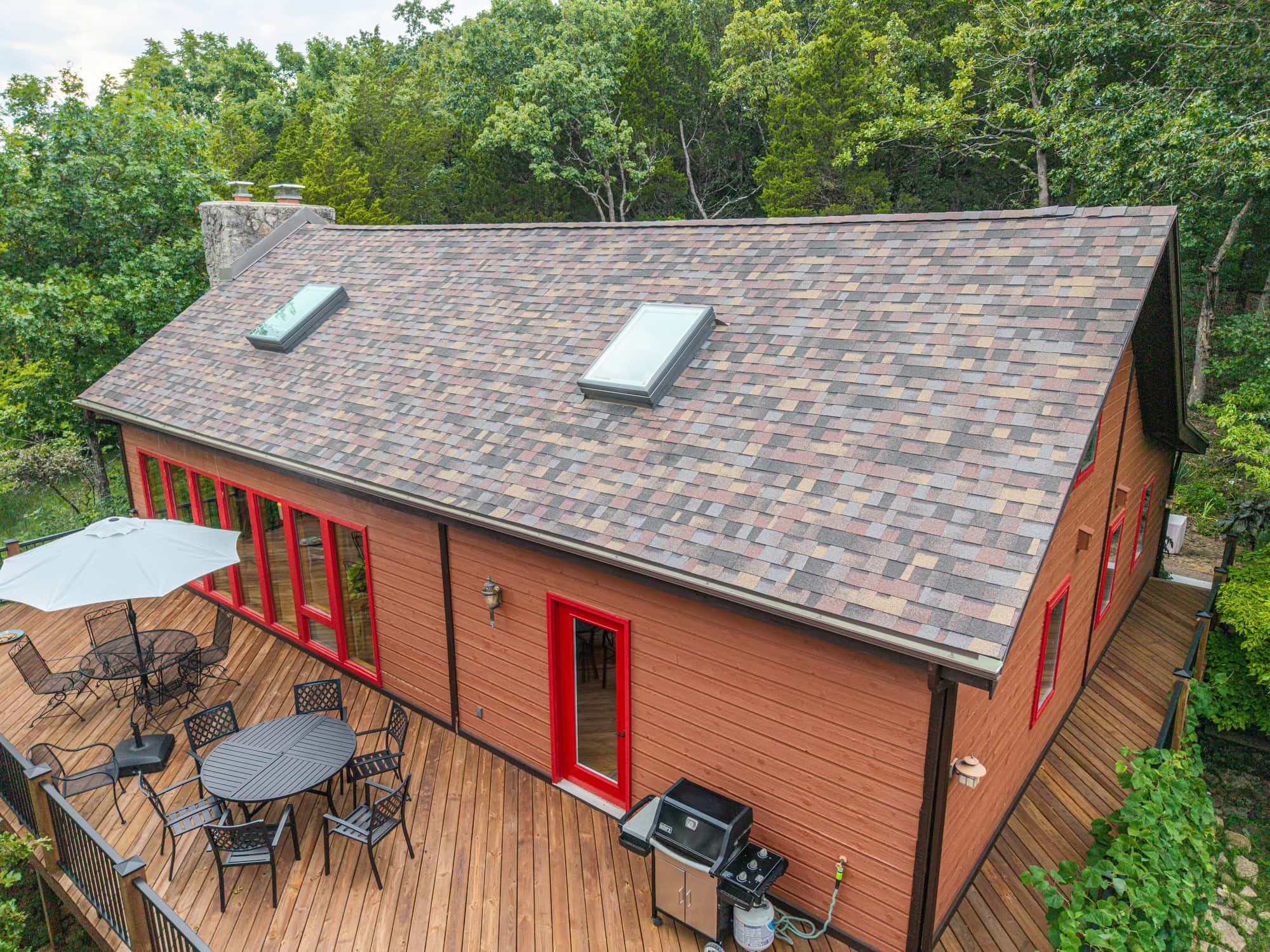 New asphalt shingle roof on a residential home in Camdenton, MO.