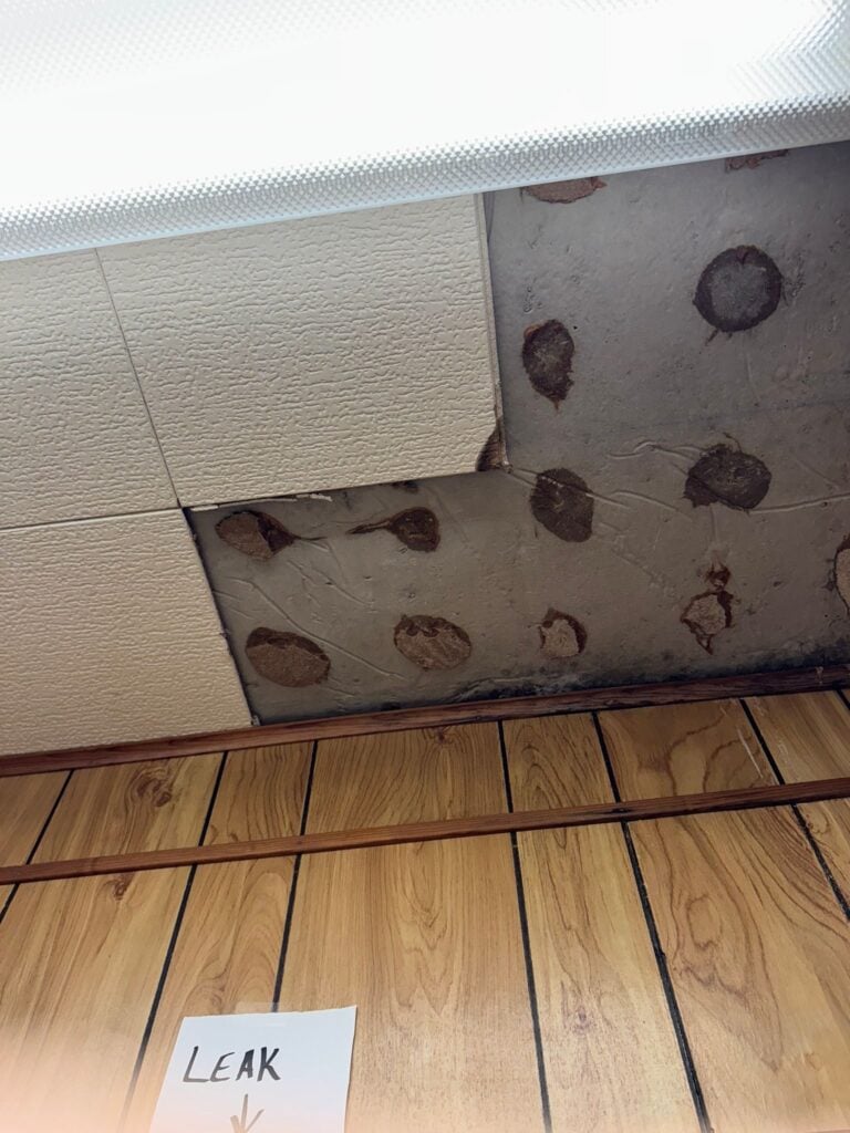 Water-stained ceiling tiles inside the Phelps County Historical Museum caused by roof leaks