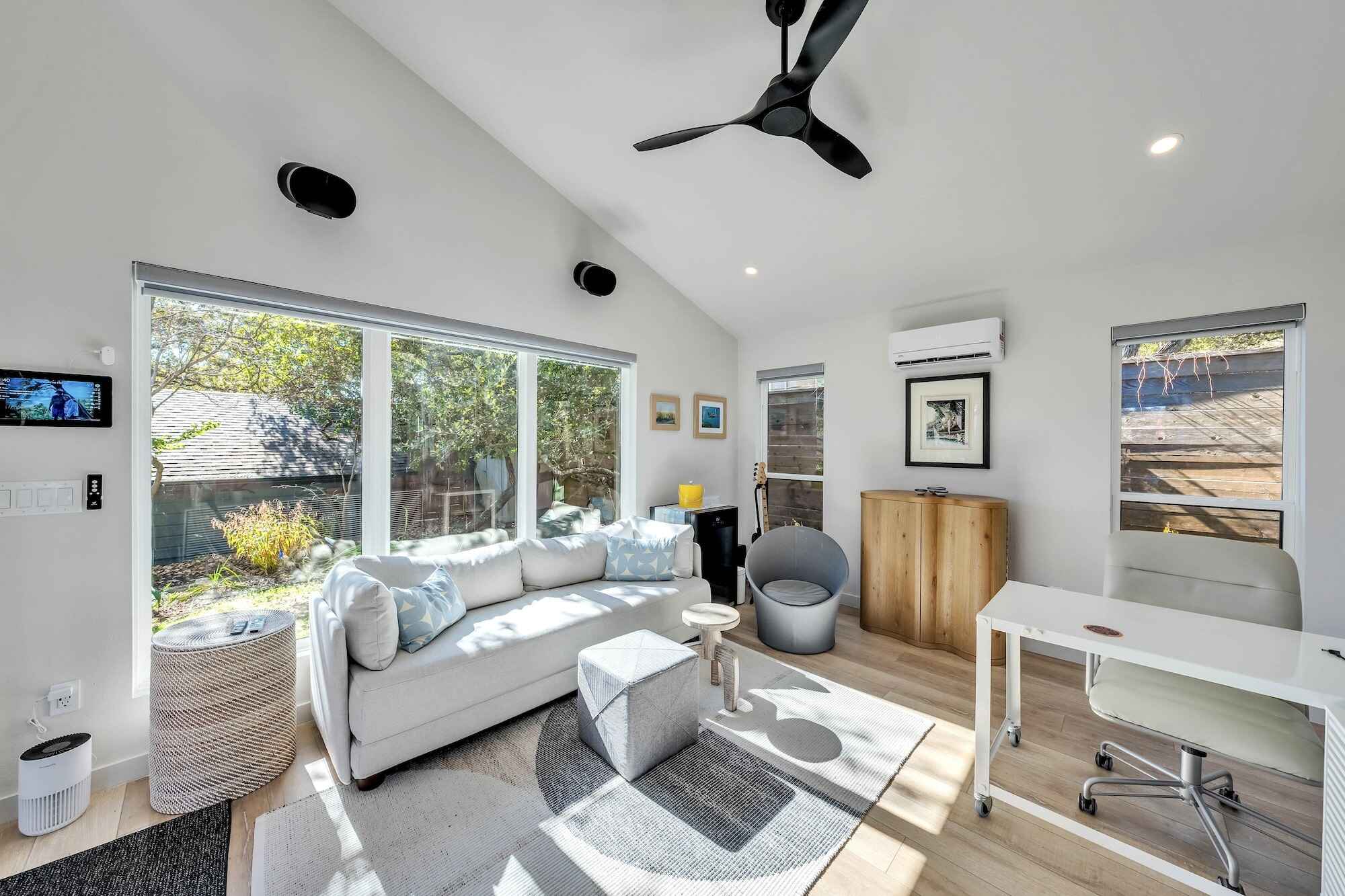 Modern home office with cozy seating area