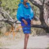 Ensemble tailleur jupe pagne tissé bleu(à brillantine or), brodée + haut en tissu coton batik couleur bleue turquoise et bleue. Avec Foulard et Chapeau brodé assortis.