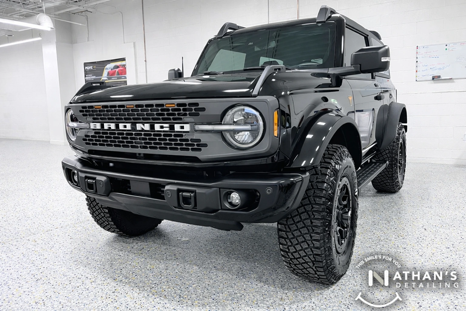 High-performance paint protection film applied to a black Ford Bronco near Akron for off-road durability.