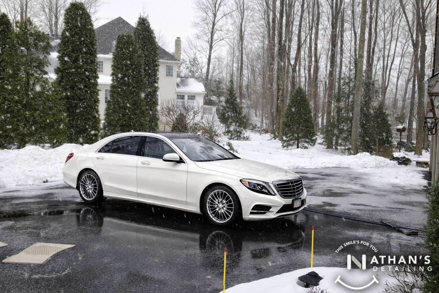 Mercedes sedan winter wash on driveway during mobile detailing