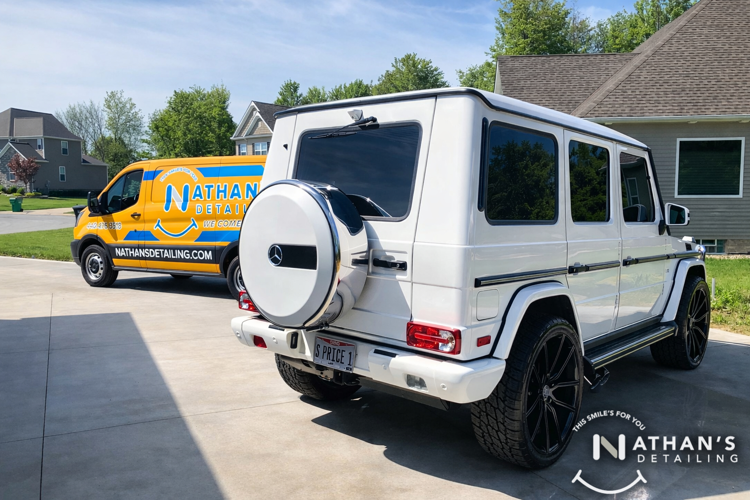 White suv detailed with mobile van behind during mobile detailing