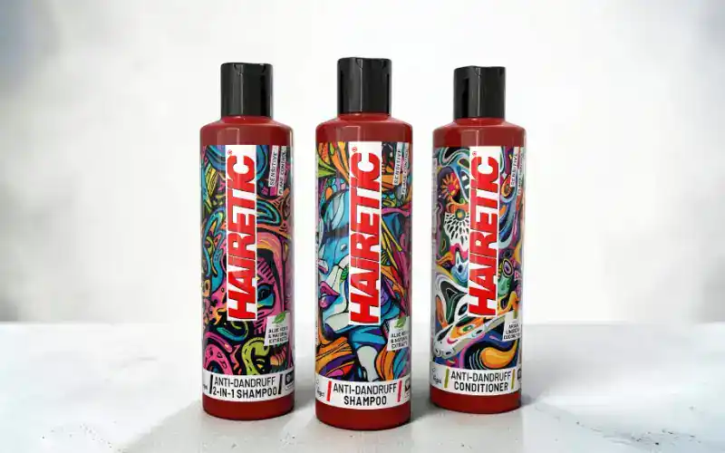 The three Hairetic anti-dandruff bottles on a white background: Sensitive Shampoo, Sensitive Conditioner and the 2-in-1