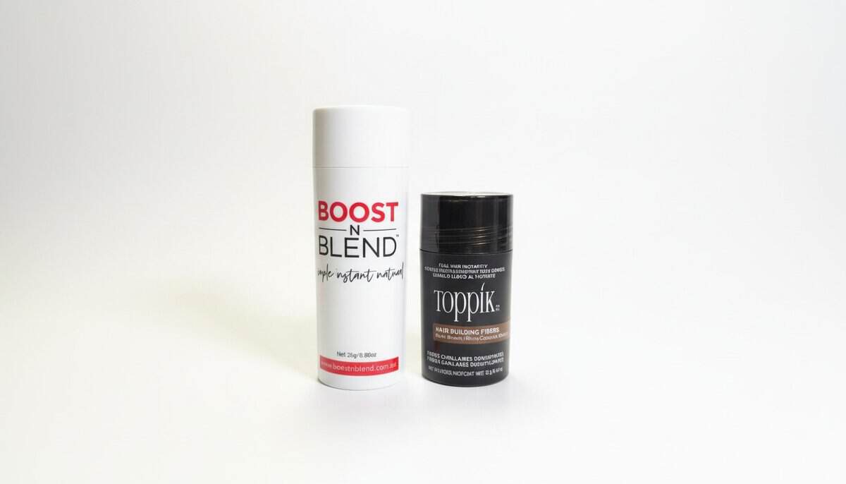 Toppik and Boost N Blend hair fibre bottles on a white table