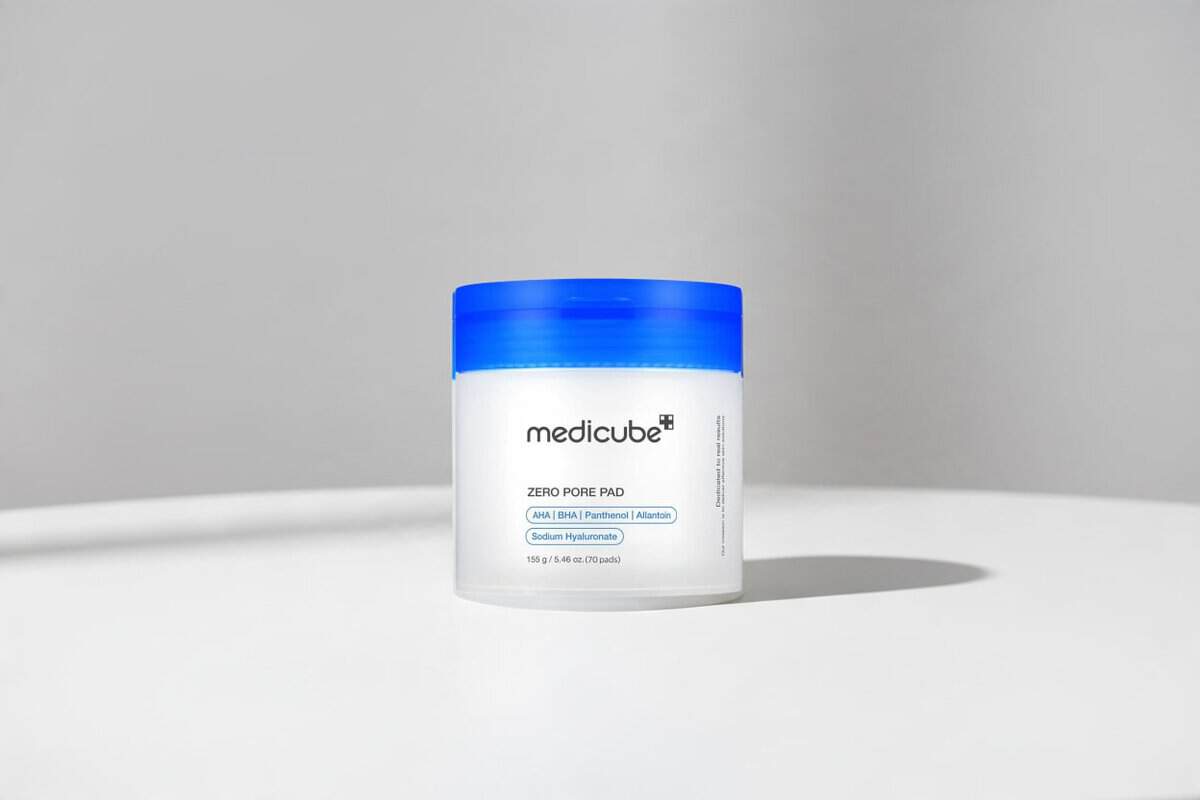 Medicube Zero Pore Pad 2.0 tub of 70 AHA and BHA toner pads on a white table