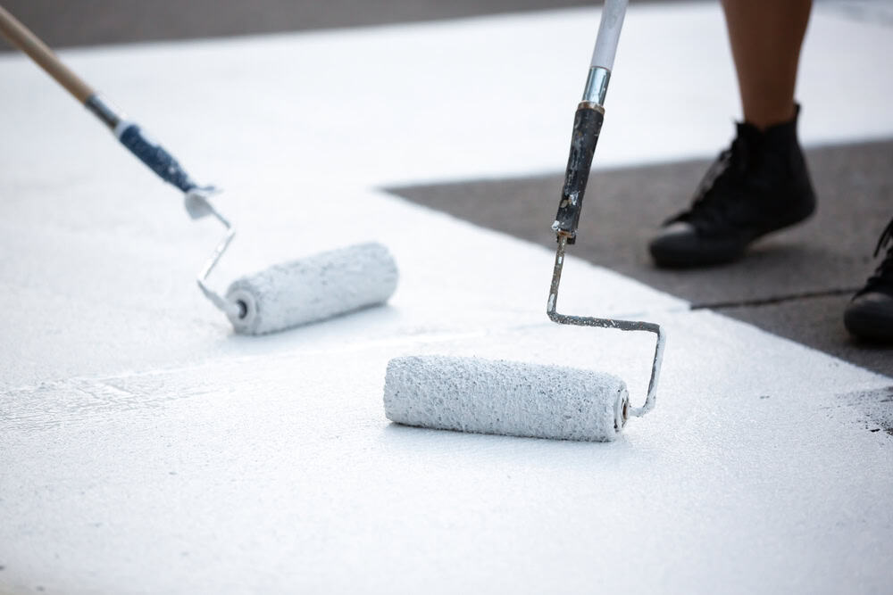 Painting the pavement with precision, one roll at a time.