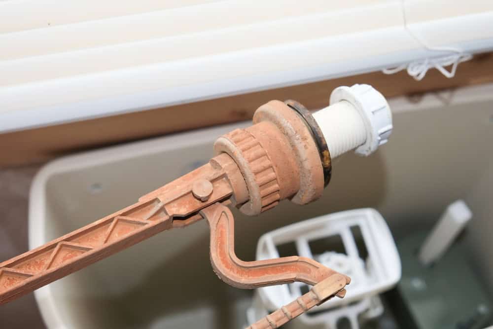 Rusty and worn-out toilet fill valve—time for a replacement!